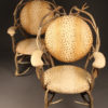Pair of 19th century French antler chairs with leopard designed upholstery
