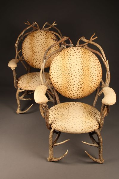 Pair of 19th century French antler chairs with leopard designed upholstery