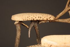 Pair of 19th century French antler chairs with leopard designed upholstery