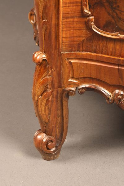Pair of late 19th century French Louis XV style commodes with burl walnut veneer and black marble top