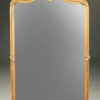19th century French Louis XV gilded mirror with beveled glass