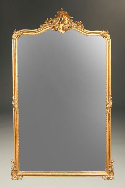 19th century French Louis XV gilded mirror with beveled glass