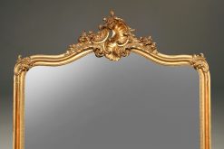 19th century French Louis XV gilded mirror with beveled glass