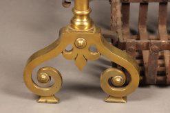 Late 19th century three piece set of brass English andirons with original iron basket