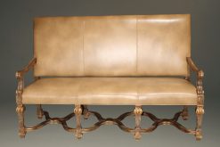 Banquette by Century Furniture company featuring hand carved frame and distressed leather upholstery